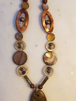 Multi gemstone statement necklace with large picture jasper pendant.