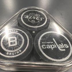 kings, capitals, Avalanche And Bruins Official NHL Hockey Pucks In Case