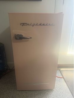 Pink dorm refrigerator
