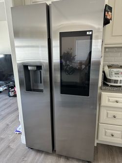 Samsung  36 in.  Side-by-side smart refrigerator.