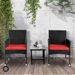 Patio set with two chairs and a small table