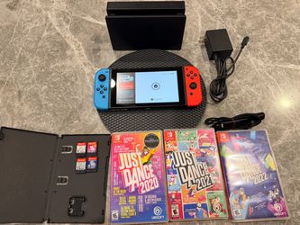 Nintendo switch with 4 games.