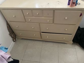 Brown dresser with the mirror to go with it