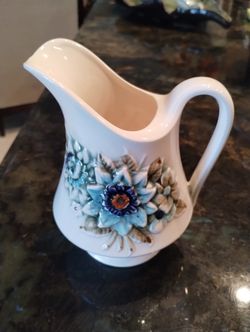 Small Ceramic Pitcher with Raised Floral Detail