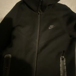 Black Nike tech , size medium ,