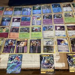 40 V,TG,Ex,Holo and Reverse Holo Pokémon cards from 2007 through 2023  2 V cards with Zeraora V SwSh263 and Magnezone V 56/196  1 Ex Quaquaval ex 52/1