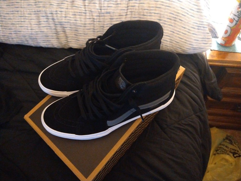 Black Vans....NEVER WORN, brand new 