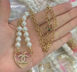 New necklace comes with dust bag
