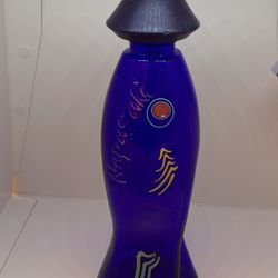 Colored glass saki bottle