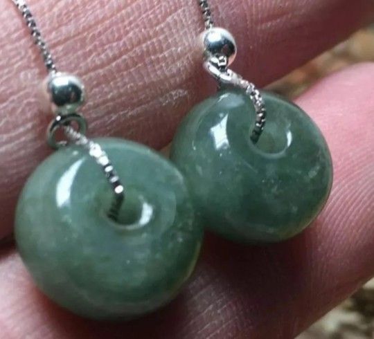 Burmese type A jadeite jade earring. Certified.