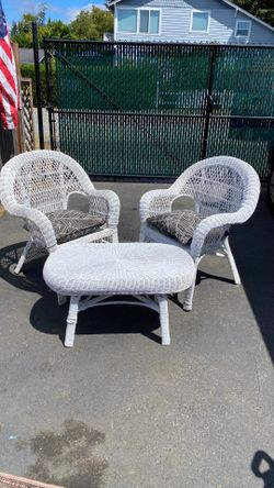 Two wicker chairs and table