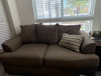 Brown 2 piece matching sofa