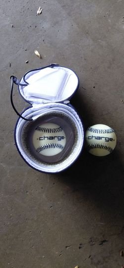 Charge Ball Glow in the Dark Baseball plus extra Baseball and charging case. LIKE NEW