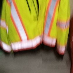 This Reflective Jacket Has Multiple Pockets ,A hood For The Rain And A Removable Fleece Lining This Is No Thin Jacket ..Best Of All You Will Be Seen..