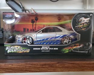 Selling Jada Tys Fast & Furious Brian's Nissan Skyline GT-R R34 Die Cast Car - Silver