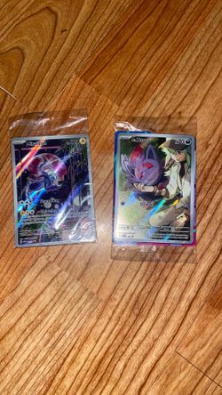 Two sealed promo cards