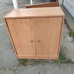 Small Cabinet with Shelf inside. 