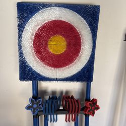 Ninja star and axe bullseye board