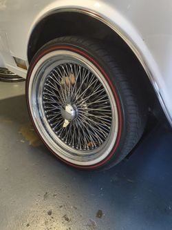 150 spoke rims and Vogue tires with red line