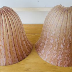 2 Glass Sconces, 8 1/2” TallX 10” wide.