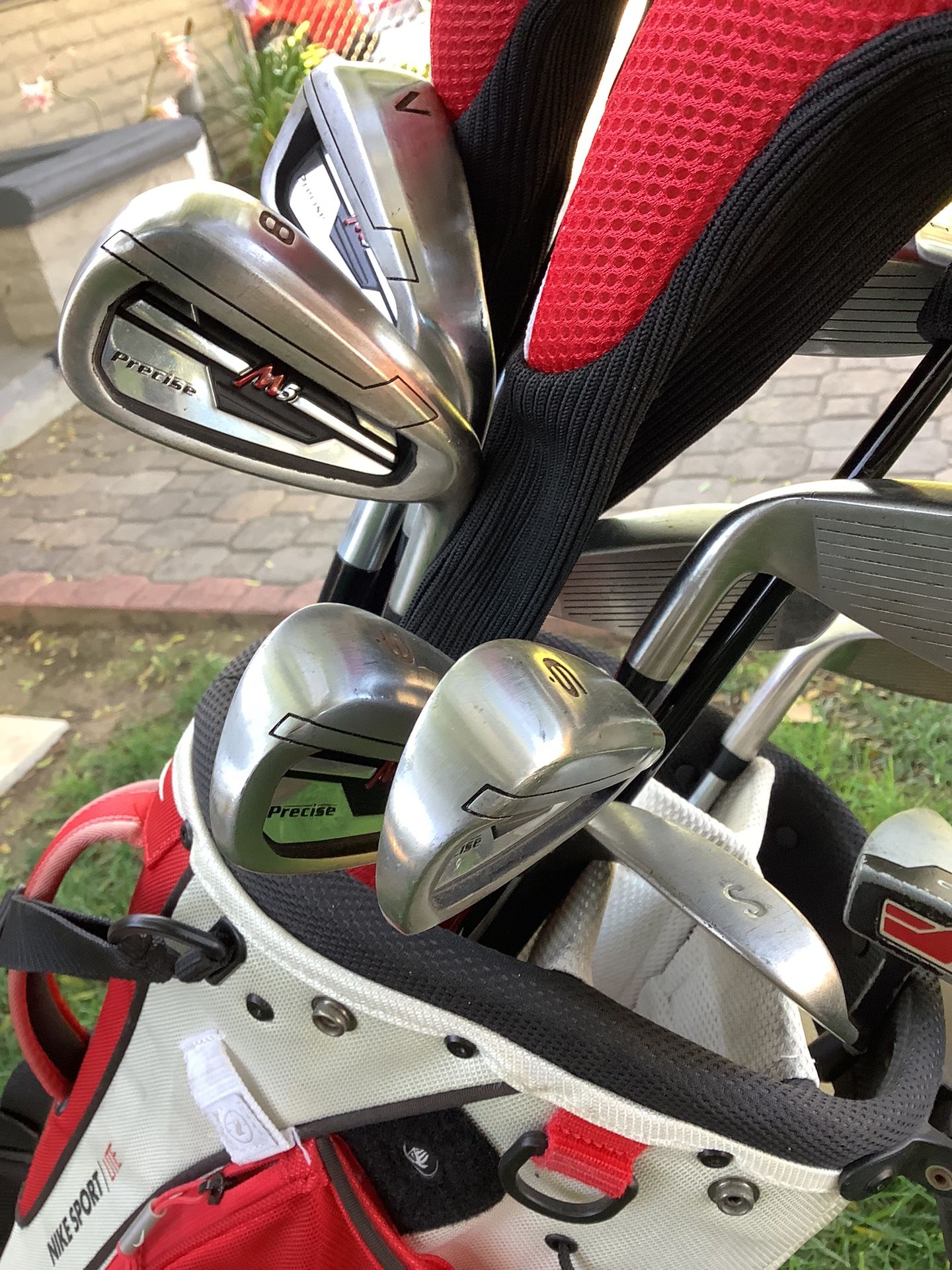 PRECISE M5 GOLF CLUB SET.   THEY ARE LIKE NEW.   RIGHTHAND CLUBS.  DESIGNED FOR BEGINNERS AND ADVANCED PLAYERS. 