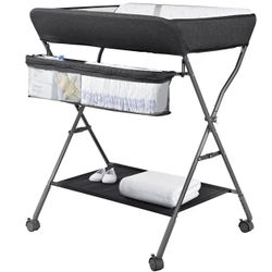 STILL IN BOX. Portable baby changing table
