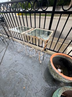 Both vintage wrought iron nesting tables for $50