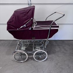 Vintage baby carriage stroller by Wonda.