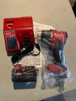 Milwaukee M18 FUEL Gen-2 18V Lithium-Ion Brushless Cordless Mid Torque 1/2 in. Impact Wrench with Battery and charge.