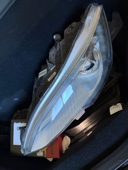 FREE Tesla Headlight and Hood for parts!