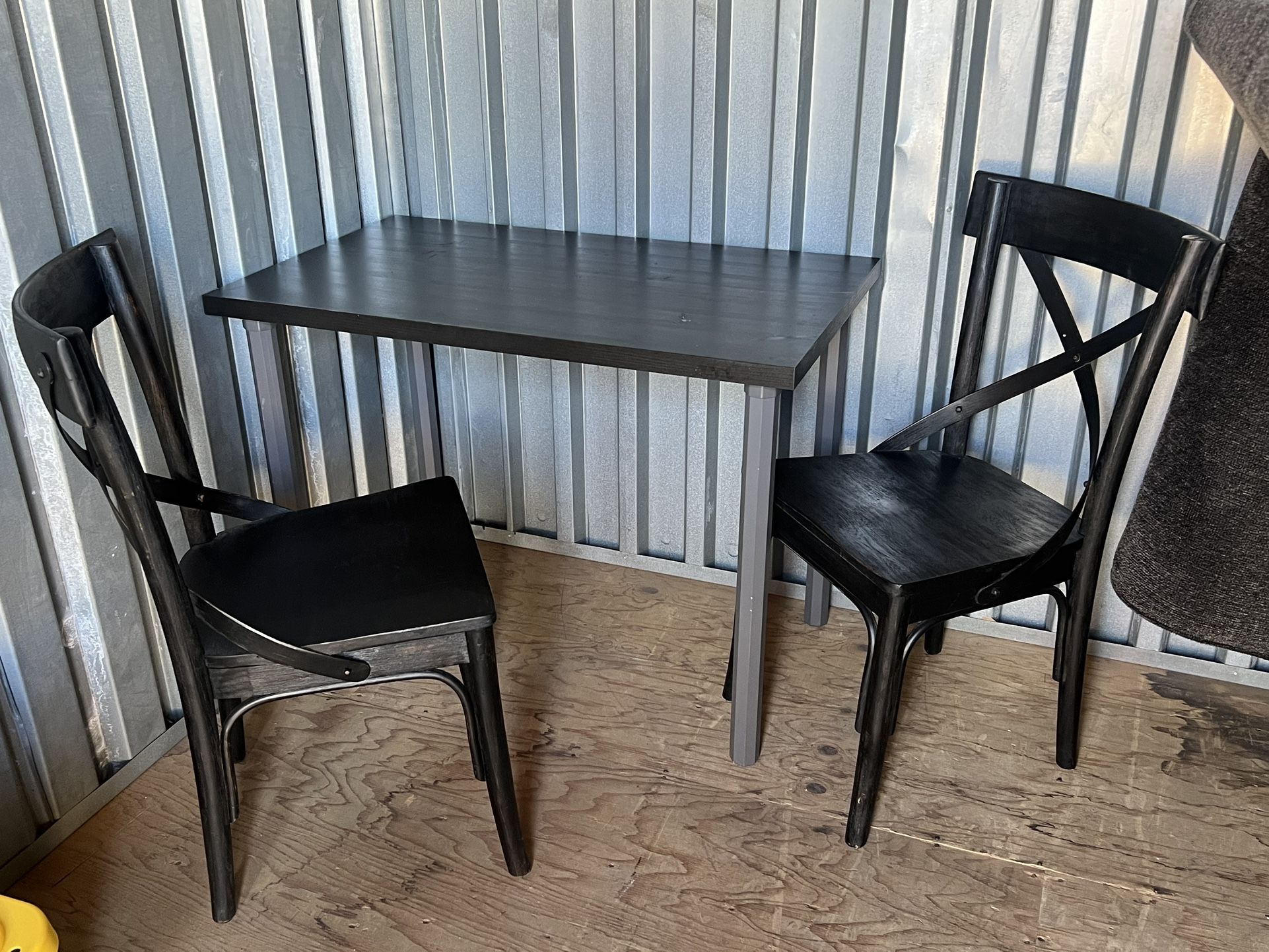 2 Chairs And A Table 