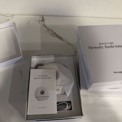 Hot and Cold Facial Sculpting Gua Sha -NEW PLASTIC SEALED BOX WITH MANUAL AND CHARGER