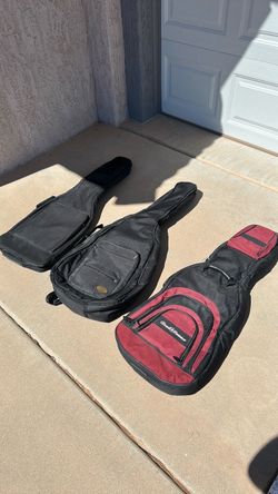 Three soft shell guitar cases