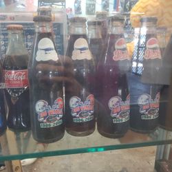 Antique Coke and Pepsi bottles never opened
