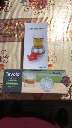Barbuzzo spin the shot and tovolo golf ball ice mold  set of  3. $ 20 dollars both