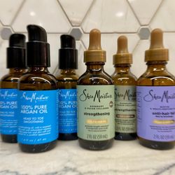 Shea Moisture oils; 100% Pure Argan Oil for head to toe smoothing; Rosemary & Vegan Collagen strengthening scalp and hair oils; OR Biotin anti-hair fa
