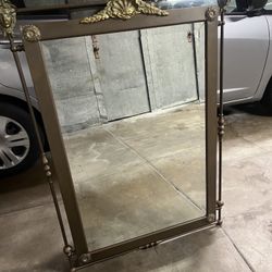  Bronze Mirror with ornate Face and Floral Medallions Beveled mirror - no peeling or scratches44” X 33”