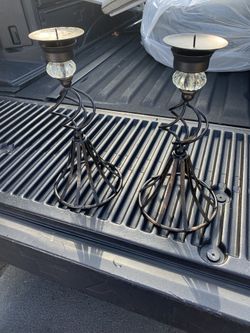 Pair of metal and glass candle holders