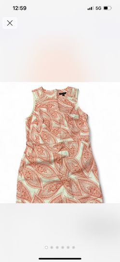 Banana Republic sleeveless dress with a white background and a red/coral paisley print. New never worn size 6