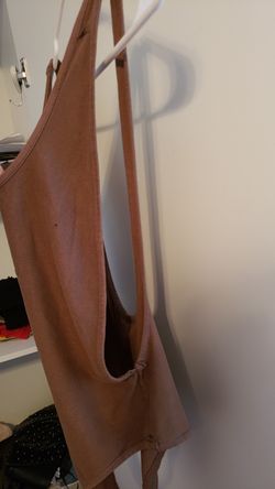 Brown body suit