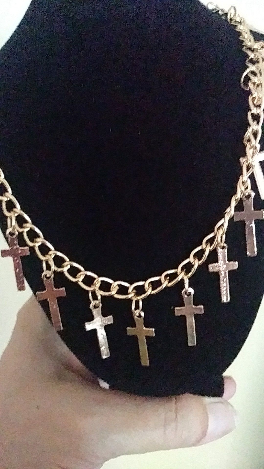 Choker length gold tone cross necklace