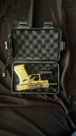 Golden Pistol Lighter (San Bernardino Ca)