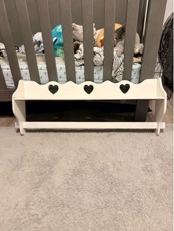 White shelf with hearts