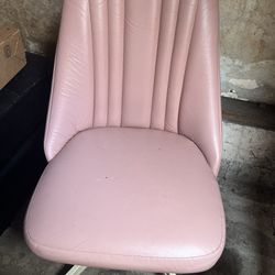 2 pink vintage chairs 