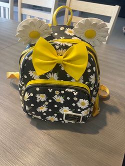 Very Cute Loungefly Backpack Of Daisies. With a Big Yellow Bow. New never used .