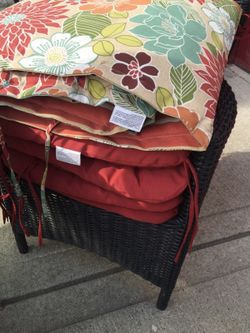all the red .. & flower cushions .. $30