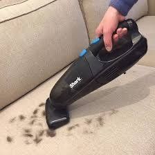 ❤️ Shark Cordless Pet Perfect Handheld Vacuum featuring a black body with blue power buttons & detachable brush roll ❤️
