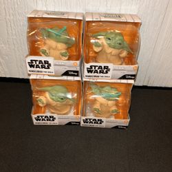 Hasbro Star Wars The Bounty Collection The Child (Grogu) collectible figures, featuring "The Force" pose (collection #1) and the "Froggy Snack" pose (