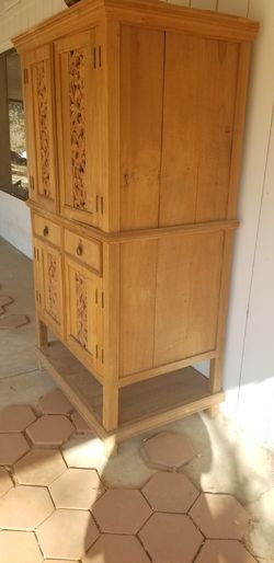 Hand carved cabinet
