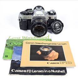 Near MINT Canon AE-1 Program 35mm SLR Film Camera w/ Canon 50mm Lens & Manuals